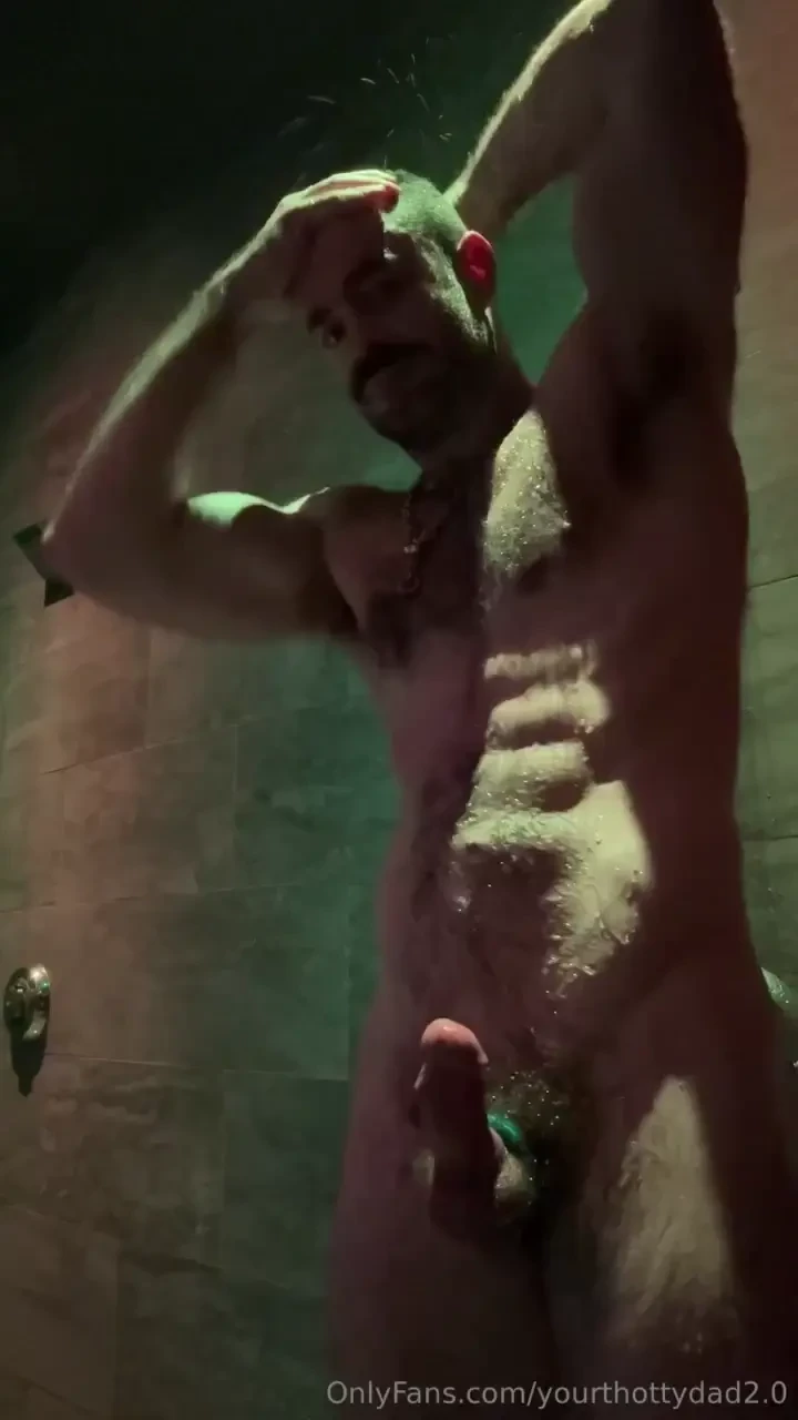 Washing sweat lube and cum off of me at the bathhouse when i look up 