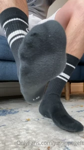 Just a quick video of me pulling up my long black nike socks for you