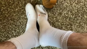 Taking off my sweaty bean boots to reveal my wet socks after shoveling