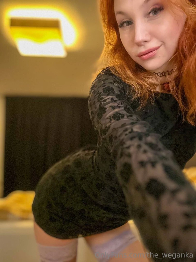 Little black dress stockings and a bed in the background you have me 