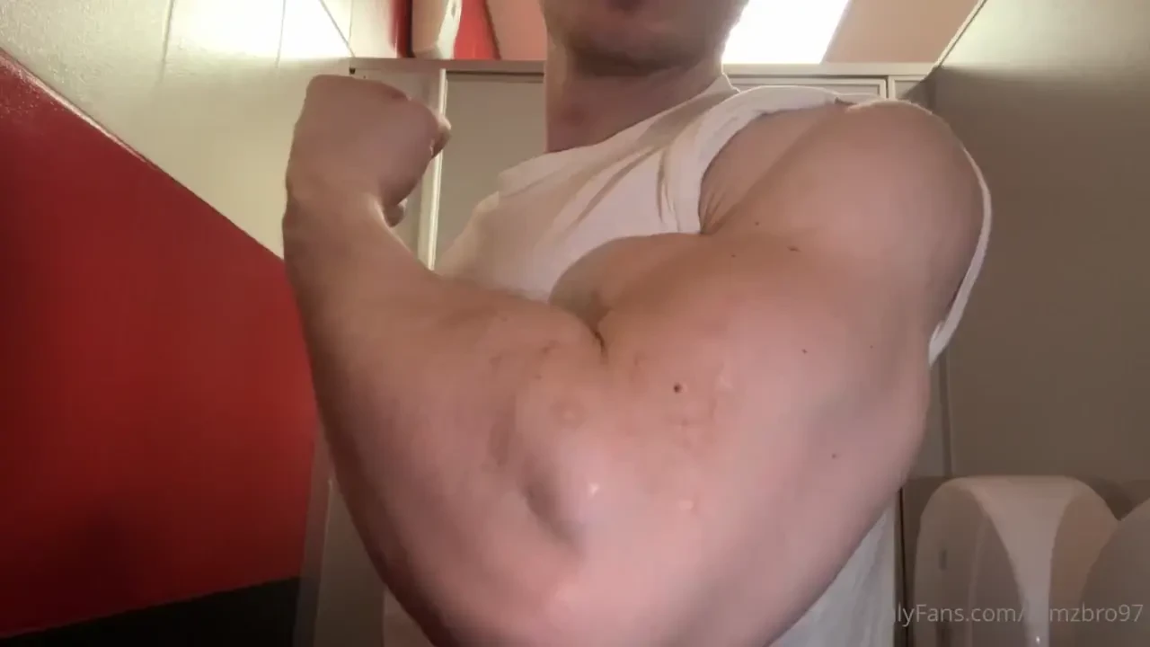 Big arms flexing in white t-shirt 