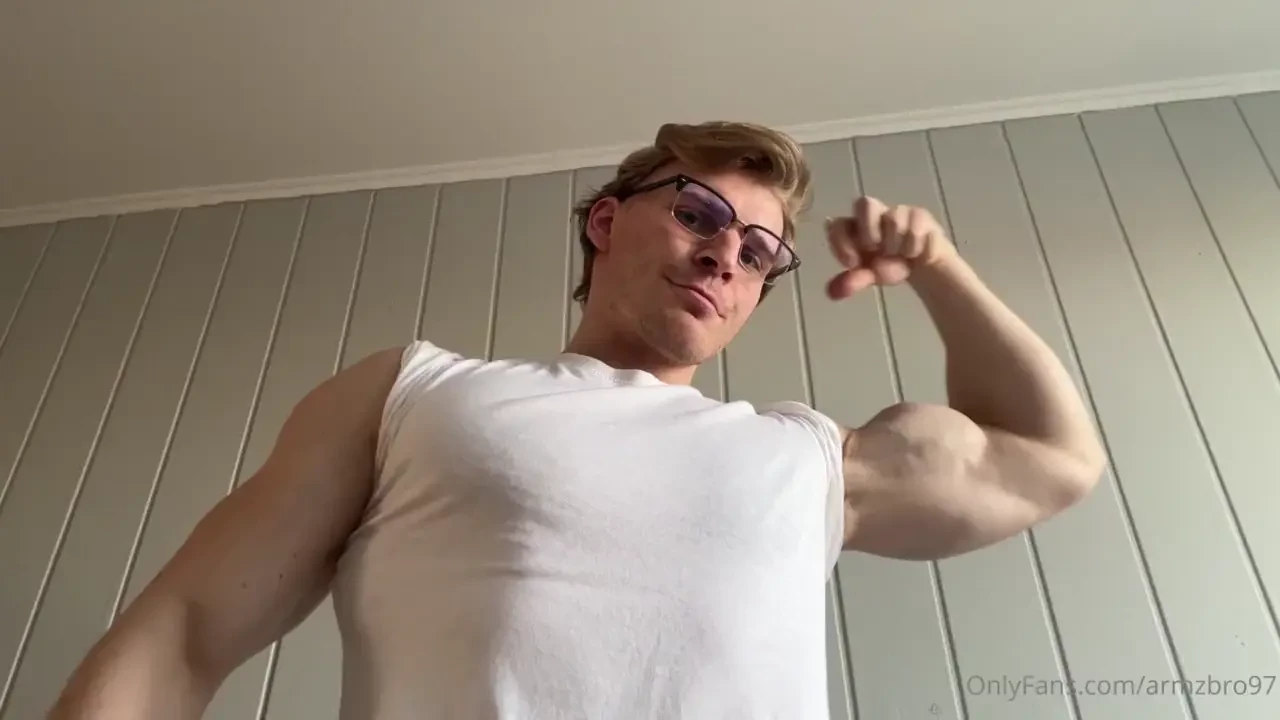 Flexing big arms in white t-shirt once again 