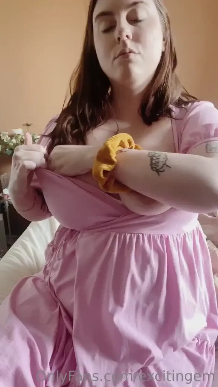 This barbie has a little bit of trouble taking her dress off 