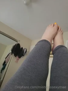 Toe nails painted yellow