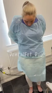 Amy getting ready for what looks like it may be a messy procedure