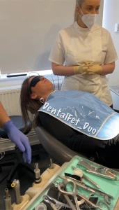Kate waits patiently for the numbing to kick in as the dentist and his