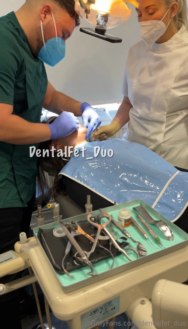 Kate lies still in the chair mouth open as wide as it ll possible go 