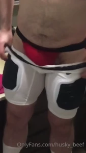 Taking off football gear with a boner