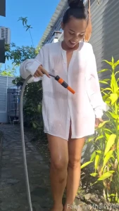 Watering the plants with only one piece of clothing on me - white