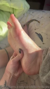 Feet sunlight and lotion