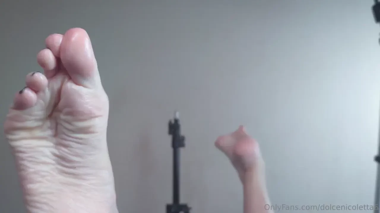 Title beautiful footjob with two cumshots featuring exaggerated moans 