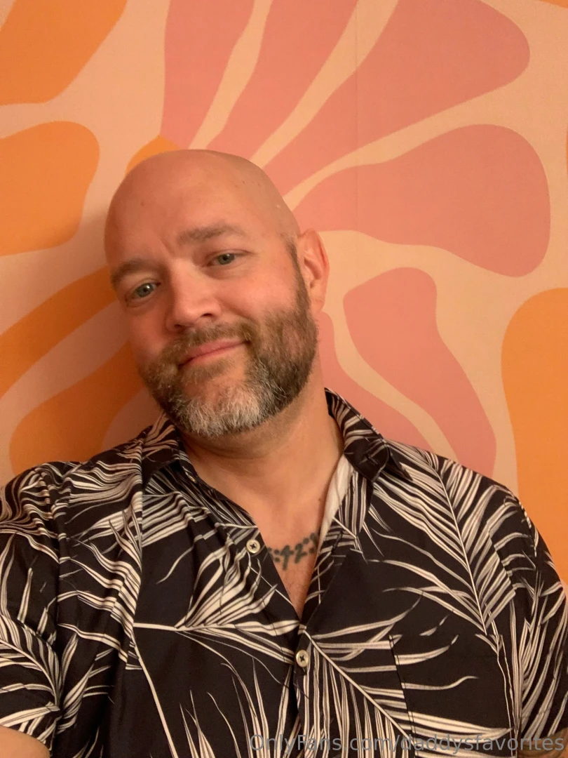 Rare photo of daddy with a shirt on 