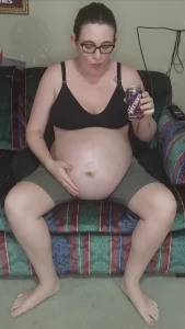 Mommy expanded her big fat pregnant belly with some pop to get all
