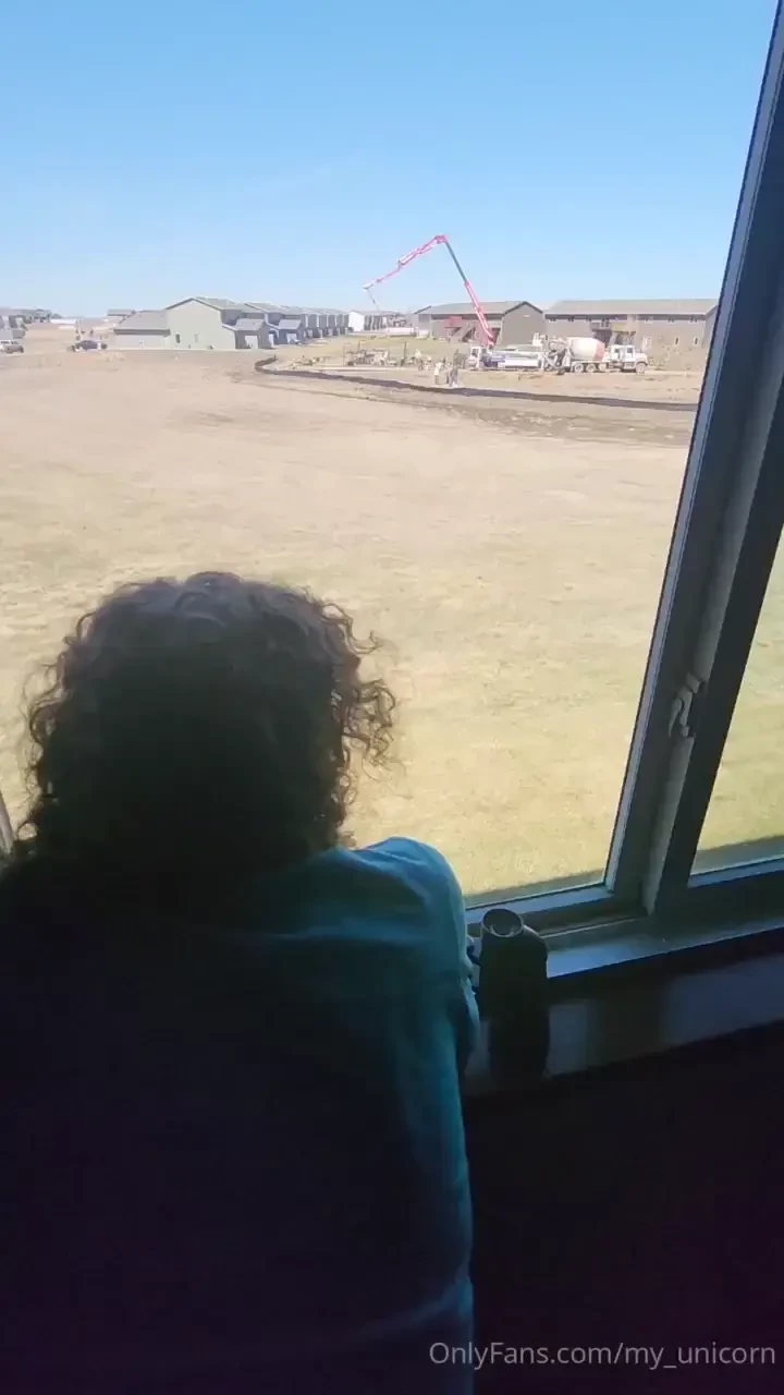 I was looking out the window at the construction workers because i was 