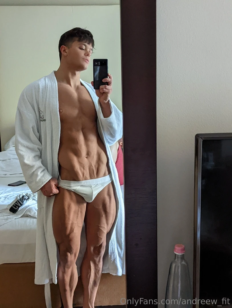Mirror shot robe wide open abs on display briefs barely holding it 