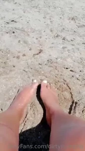 My feet playing with sand and what would you do with them tell me