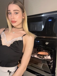 A woman in the kitchen a pie in the oven and life is good how nice it