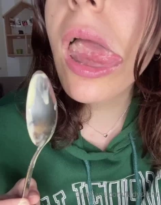 Licking an ice cream