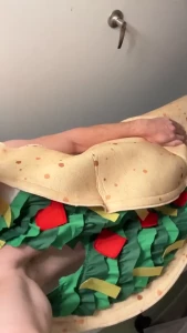 This taco has got some secret sauce in it what are you wearing for