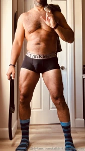 Getting undressed after a long day at the office