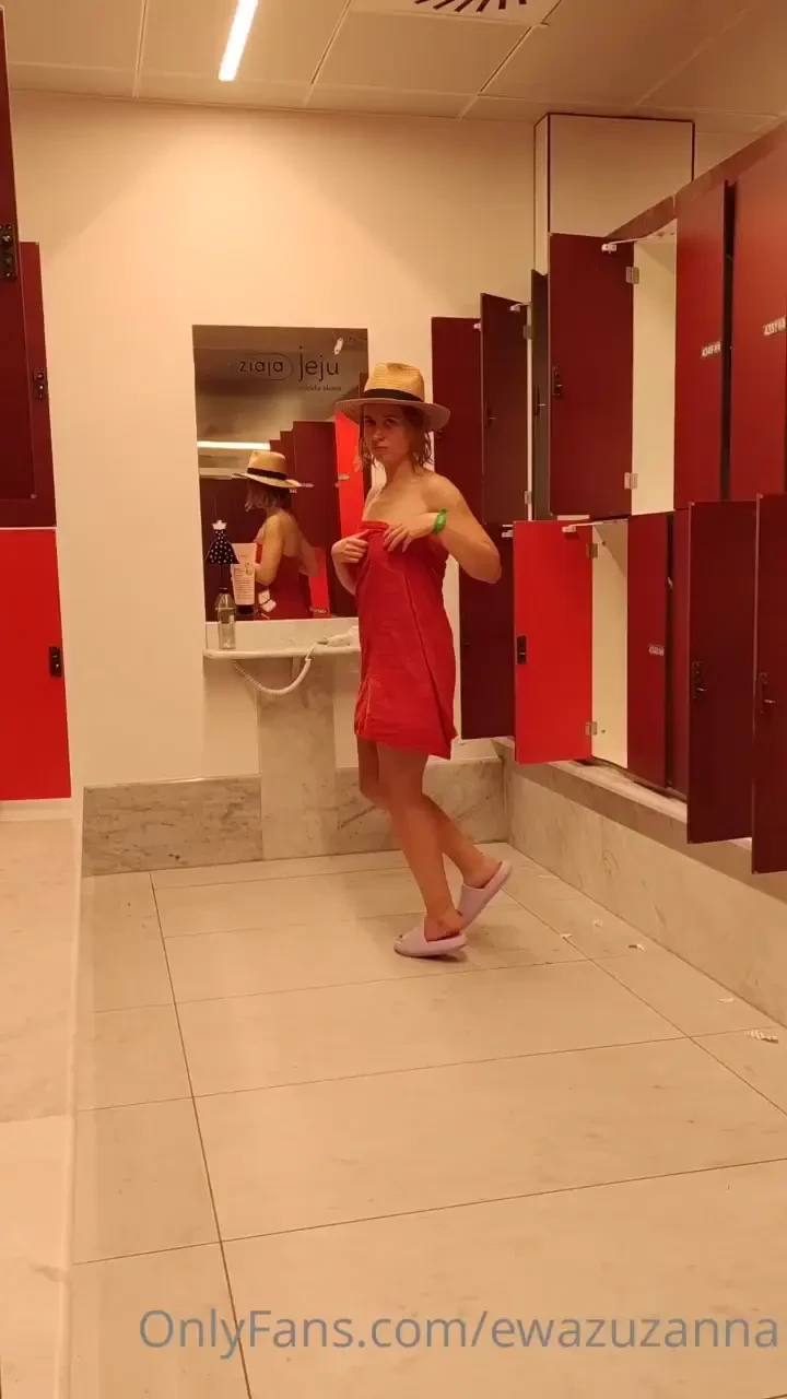 Taking out towel in pulick at the swimming pool would you do it wanna 