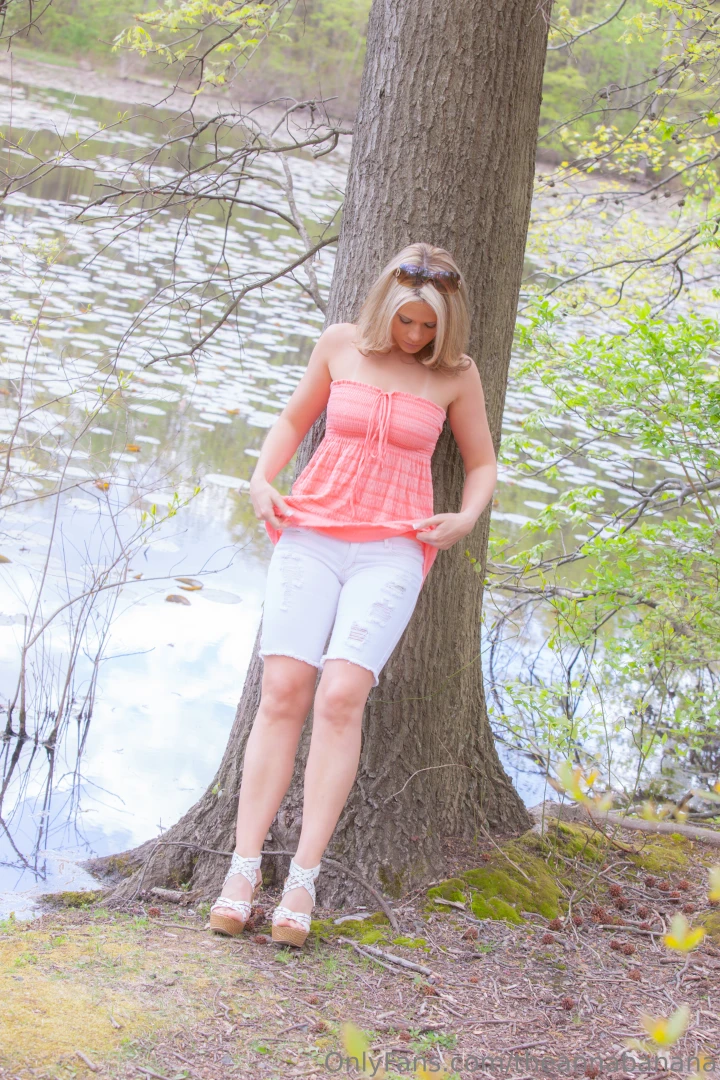 Pink top white jeans outdoors part 45 