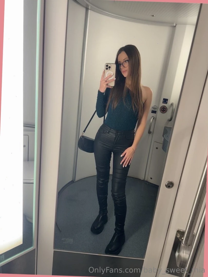 She ran her finger along the rim of her glass looking off into the 