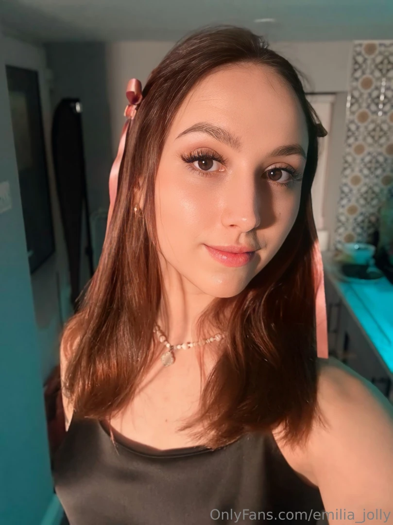 Bows in my hair and softness in my smile it s giving doll energy 