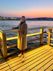 Evening city lights and me without a bra under my dress