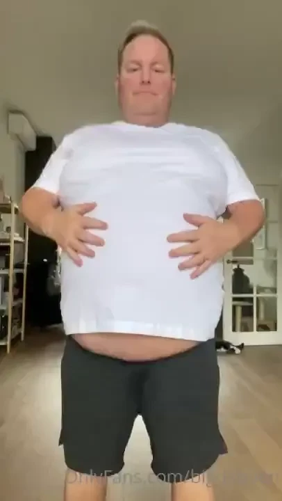 Walking in a tight t shirt and then showing some major belly this has 