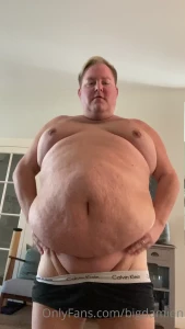 bigdamien - Look at this massive belly loved showing off how huge and heavy it is 