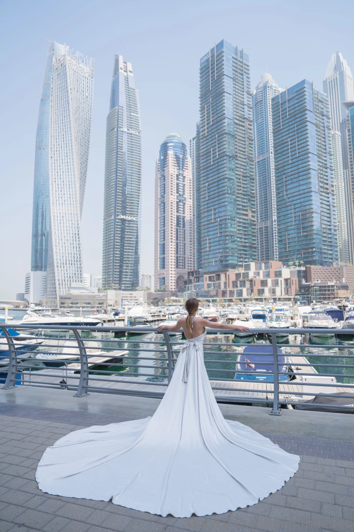 White airy dress is the embodiment of lightness and refined femininity 