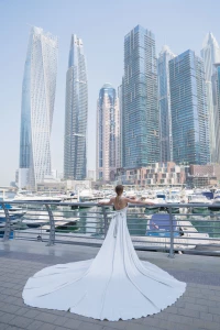 White airy dress is the embodiment of lightness and refined femininity