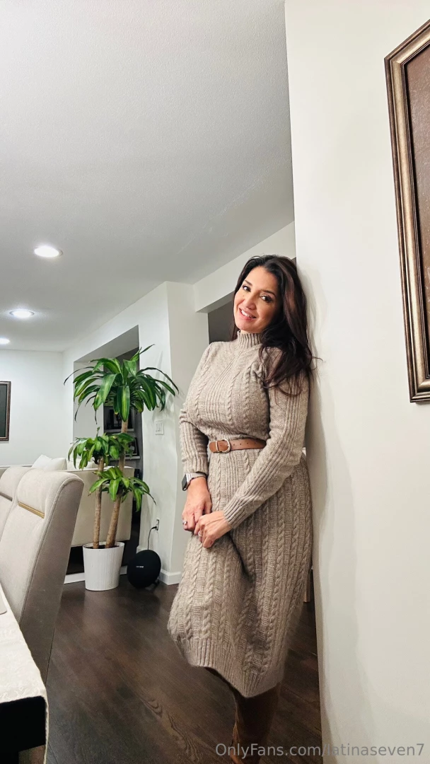 Underneath the sweater dress 