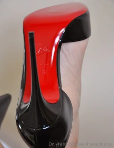 Louboutin iriza with the cut away sides exposing the arch