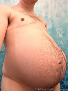 Getting so big and round my bellybutton is even starting to stretch i