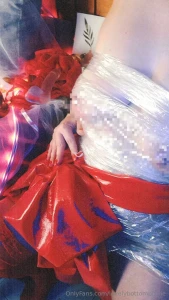 The huge red bow wrapped around my waist it s soft and feels like