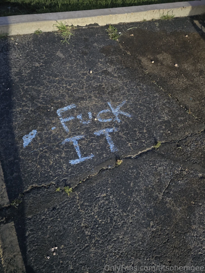 Sage words on asphalt 