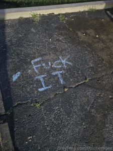 Sage words on asphalt
