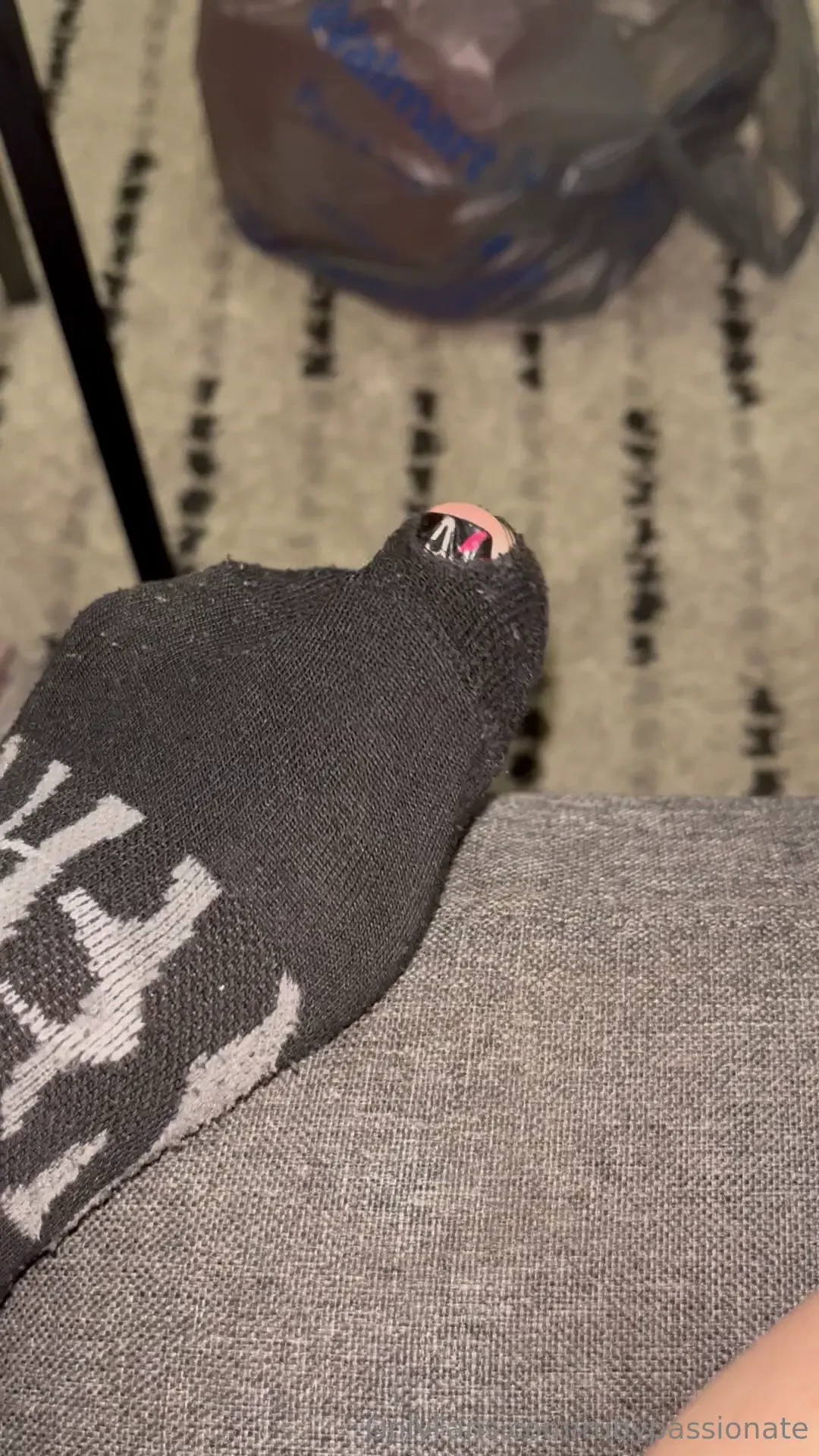 My toe wants to be free playing with the hole in my sock 
