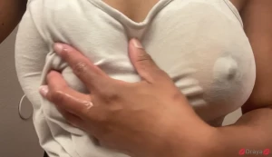 Rubbing water all over my hard nipples