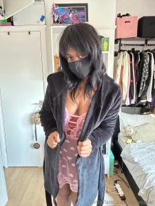 Just slipping into something almost nothing this robe s barely holding