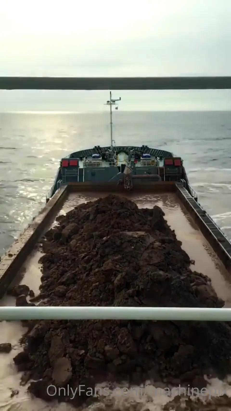 Time-lapse of split-hull hopper dredger ship releasing its cargo 