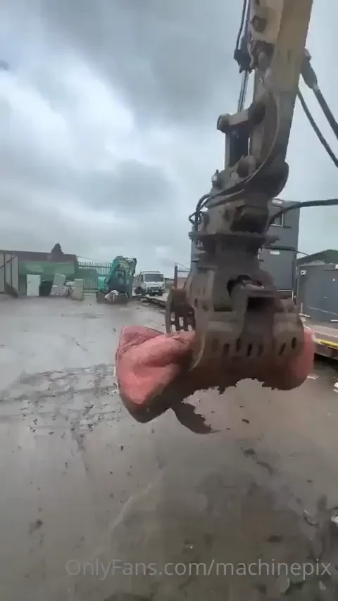 Time-lapse of an excavator mopping with a claw and mattress 