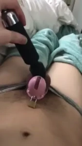 Playing with my vibrator and chastity
