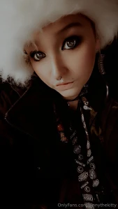 Stay warm out there this little kitten is working but dressed up for