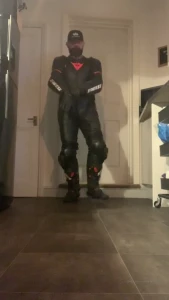 Dom leather clad biker